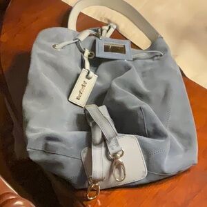 Nero giardini large blue suede purse.